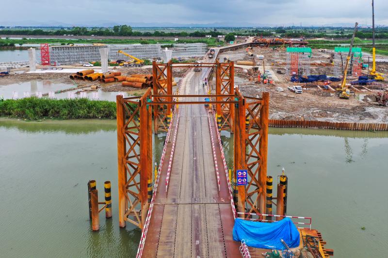 西港河,大港河,进入牛田洋片区,与西港路,光华路,西港高架桥等多条